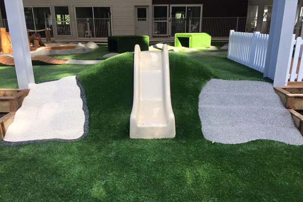 White Slide, Rubber Steps And Artifical Grass - Little Learning School In Asquith